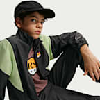 Kylian Mbappé Older Kids' Full-Zip Woven Football Tracksuit