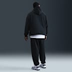 Fleecebyxor med muddar Nike Solo Swoosh för män