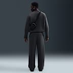 Pants de tejido Fleece de ajuste holgado con dobladillo abierto para hombre Nike Tech