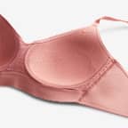 สปอร์ตบราผู้หญิงซัพพอร์ตระดับต่ำเสริมฟองน้ำดีไซน์ปรับเปลี่ยนได้ Nike Alate Minimalist