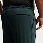 Pants versátiles Dri-FIT de pierna entallada para hombre Nike Unlimited