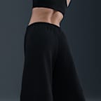 Pantalones entubados de tiro medio holgados para mujer Nike Sportswear Phoenix Fleece