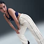 Pants con dobladillo abierto de tejido Woven de tiro alto para mujer Nike Windrunner