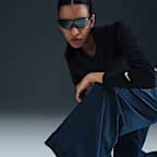 Pants de tejido Woven de tiro medio holgados con dobladillo abierto para mujer Nike Sportswear