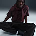 Fleecebyxor med muddar Nike Solo Swoosh för män