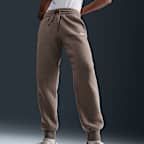 Pants de entrenamiento de tiro medio para mujer Nike Sportswear Phoenix Fleece