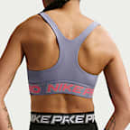 Nike Pro sports-BH uten innlegg med lett støtte til dame