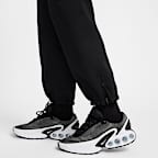 Pants de tejido Fleece con dobladillo abierto para hombre Nike Tech