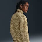 Chamarra de tejido Woven estampada y holgada de cierre completo y protección contra los rayos UV para mujer Nike Sportswear Windrunner