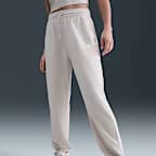 Pants de entrenamiento de French Terry oversized de tiro alto para mujer Nike Sportswear Phoenix Fleece