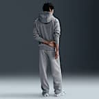 Pantalon en Fleece à ourlet ouvert Nike Club pour homme