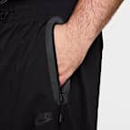 Pánské volné tkané kalhoty Nike Tech