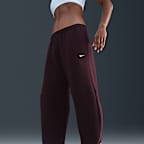 Pantalones entubados de tiro medio holgados para mujer Nike Sportswear Phoenix Fleece