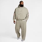 Pants de tejido Fleece de piernas anchas para hombre Nike Tech