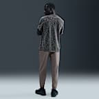 Mångsidiga byxor Nike Form Dri-FIT i avsmalnande modell för män