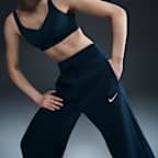 Pants de entrenamiento de tiro alto y piernas anchas para mujer Nike Sportswear Phoenix Fleece