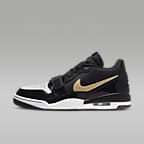 Air jordan legacy 312 black and gold sales