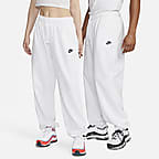 Pants de entrenamiento oversized de tiro medio para mujer Nike ...