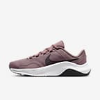 Nike legend essential best sale women's training shoes pink