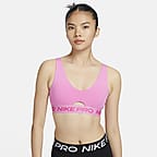 Nike Training Indy light support strappy sports bra in pink - ShopStyle
