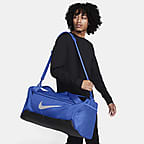 Nike Brasilia 9.5 Training Duffel Bag Geode Green The Nike Brasilia Duffel  Bag keeps all your training gear at hand. A side compartment stores shoes  separately, while inside and outside pockets help