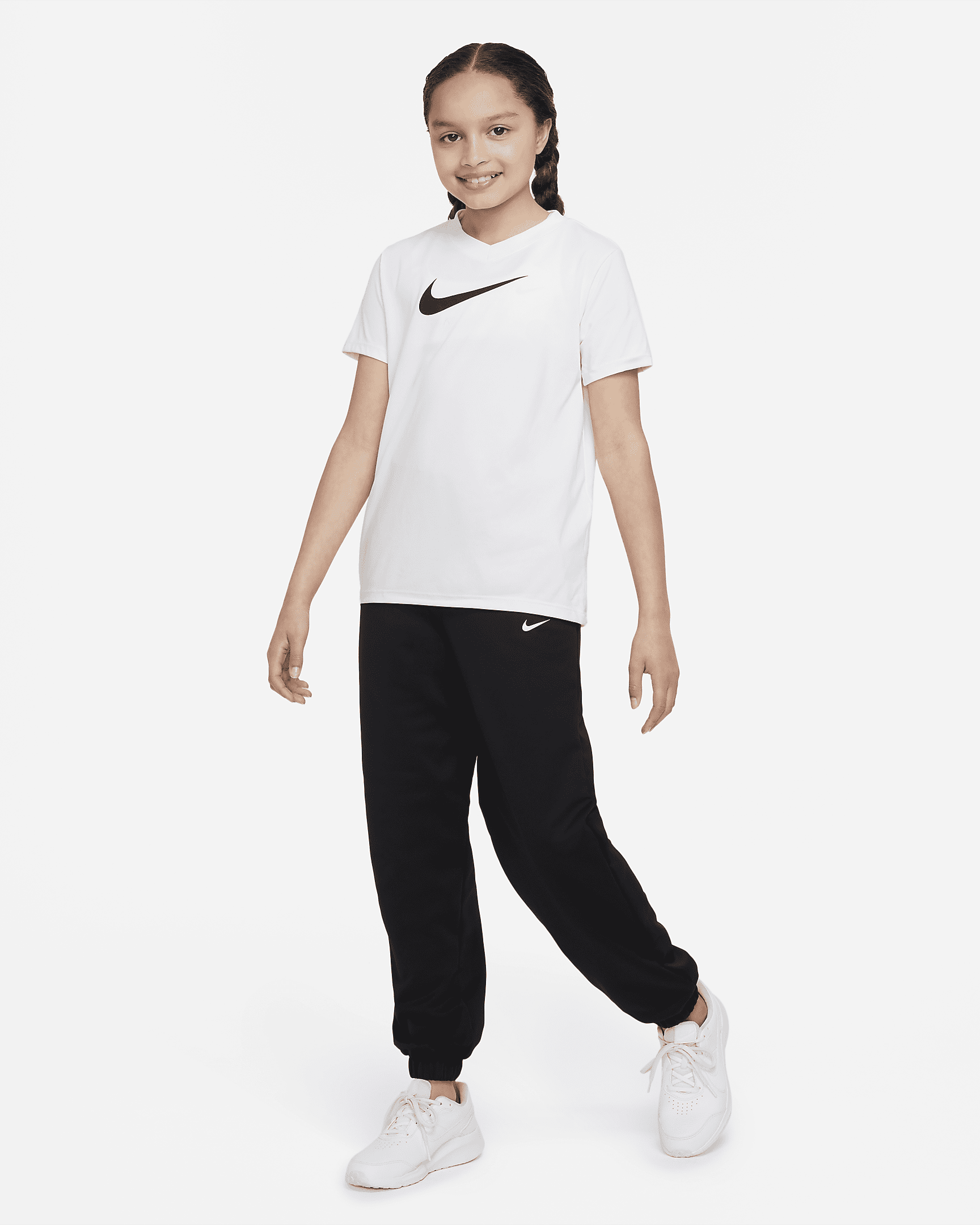Nike Therma-FIT Older Kids' (Girls') Cuffed Trousers. Nike LU