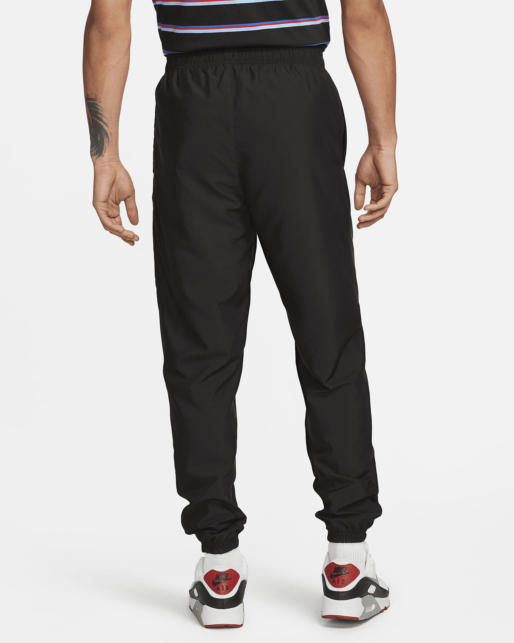 Nike Sportswear Men's Woven Trousers. Nike AE