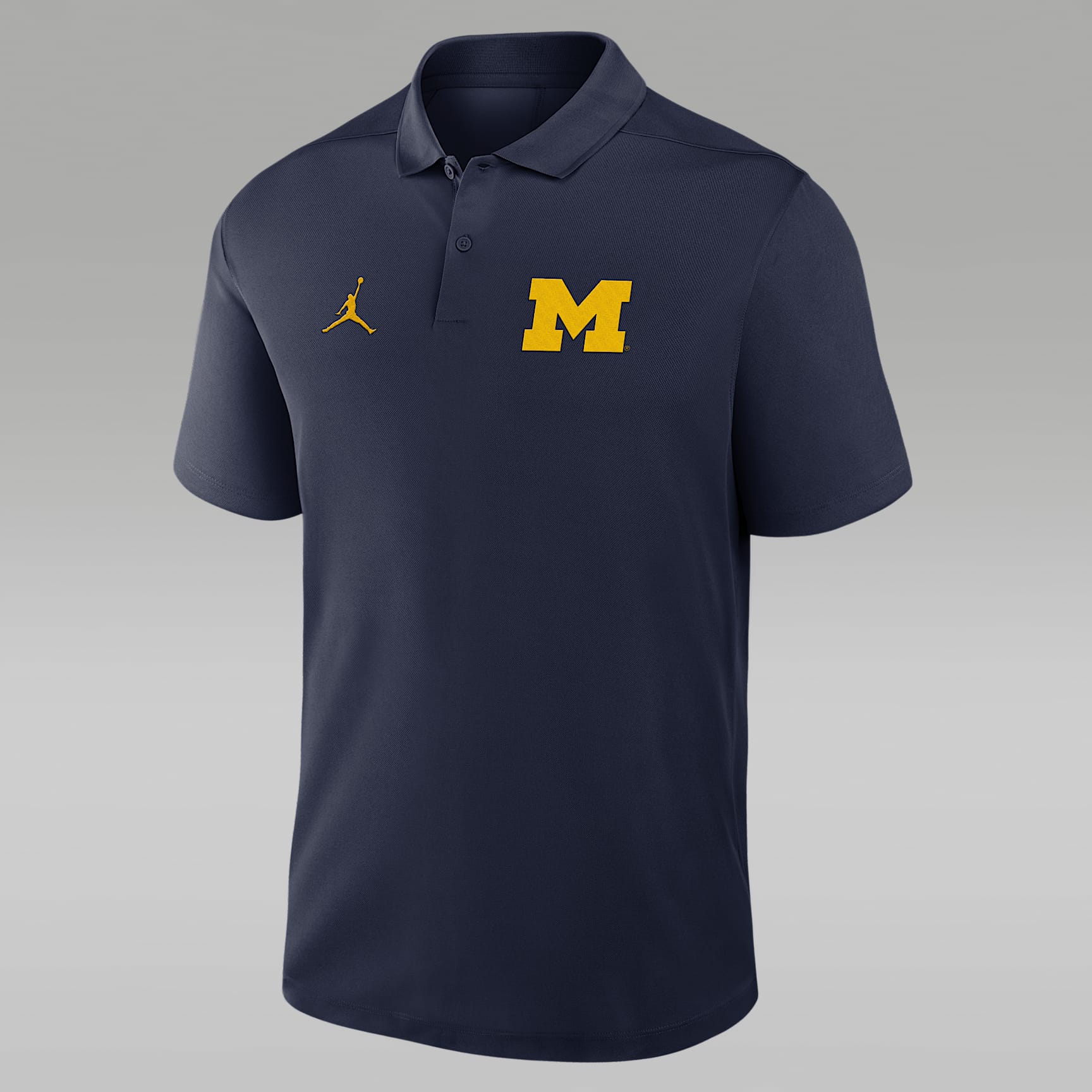 Polo universitario Nike Dri-FIT para hombre Michigan Primetime Victory Primary Logo