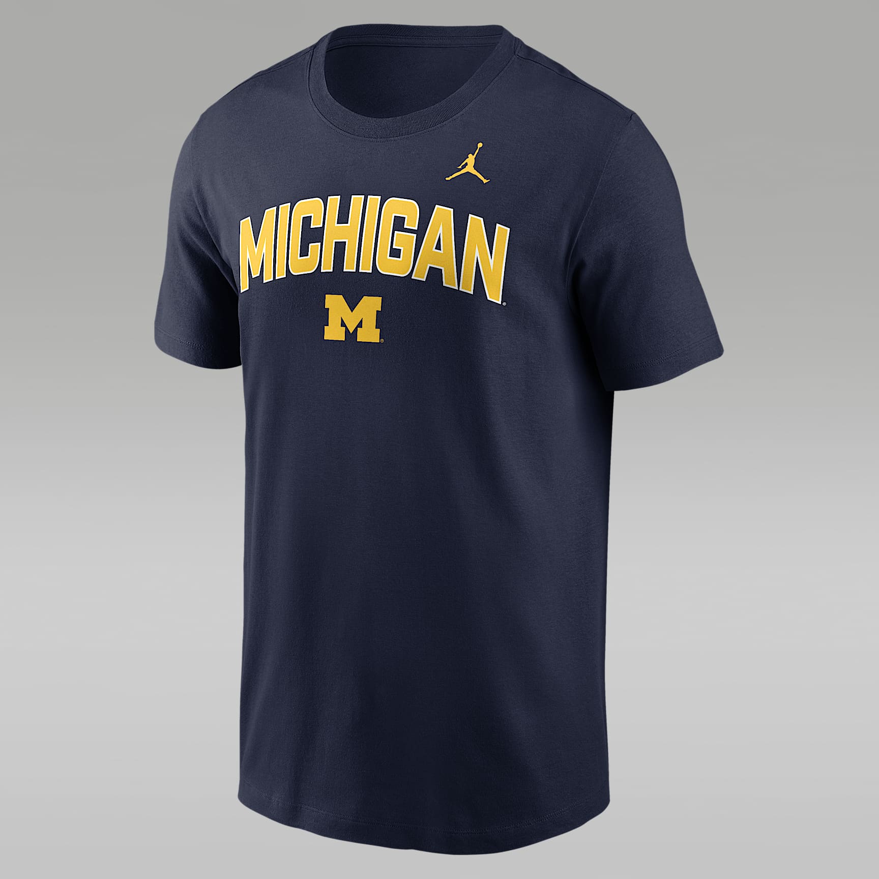 Playera universitaria Nike para hombre Michigan Primetime Arch Stack