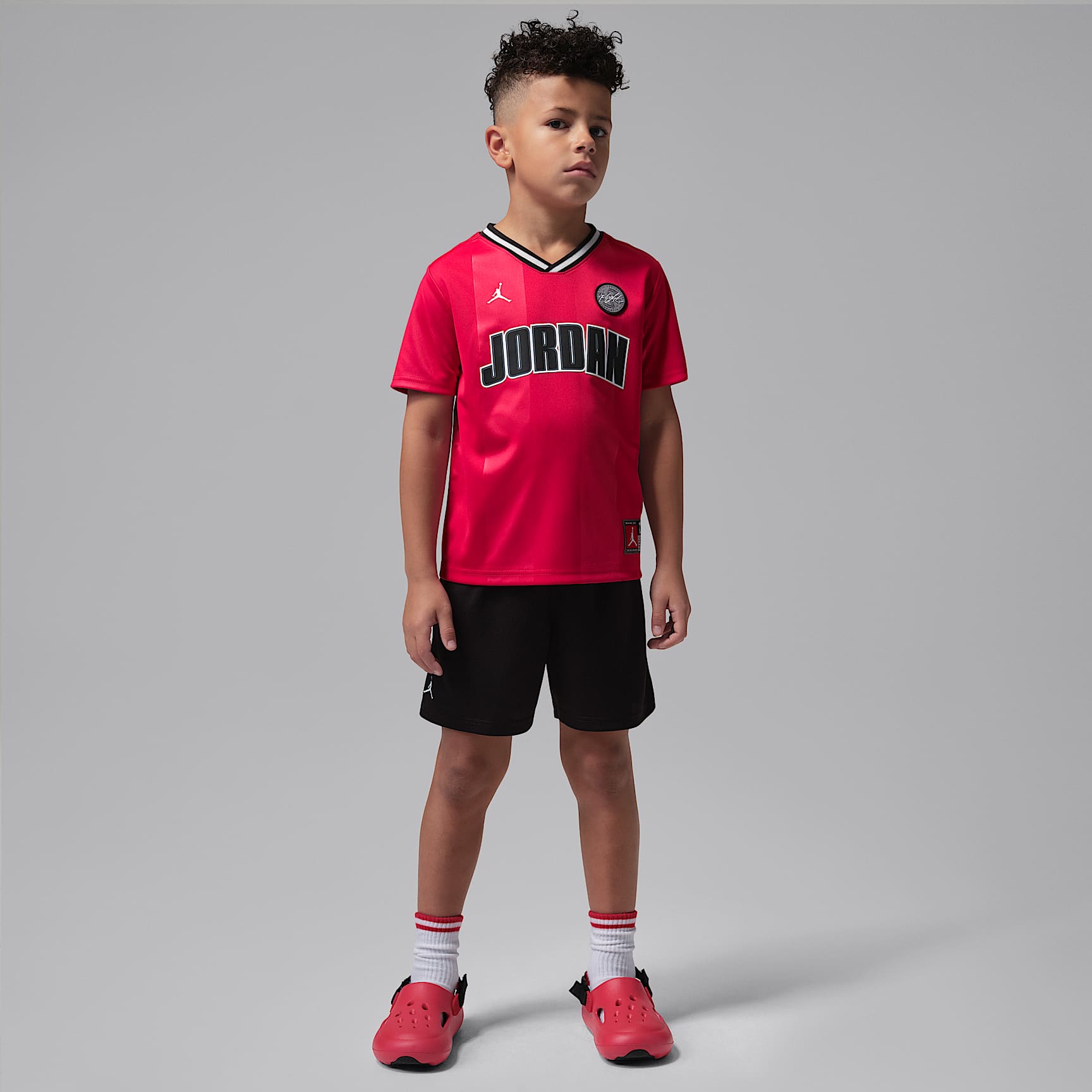 Conjunto de jersey y shorts de malla para niños talla pequeña Jordan