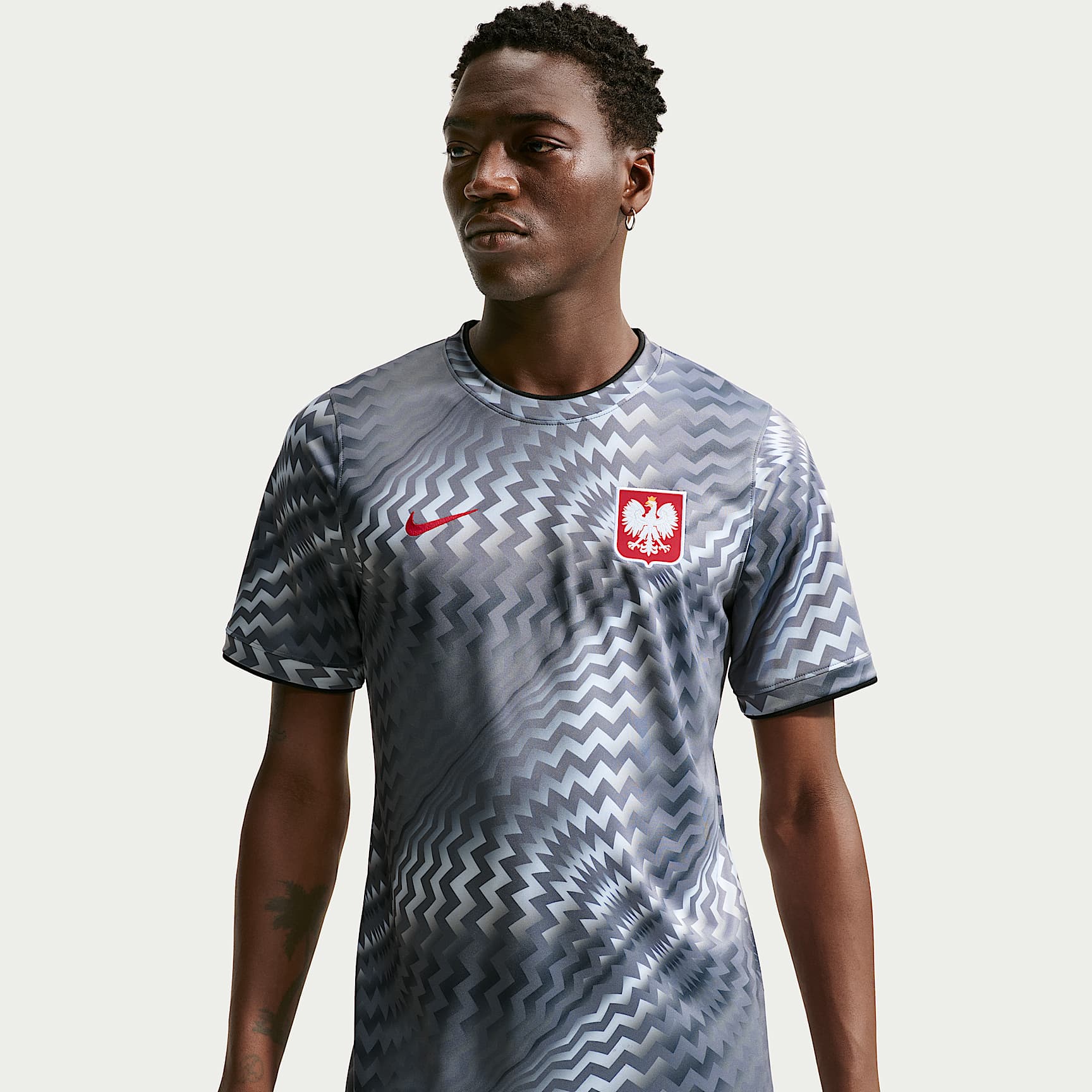 Haut de foot à manches courtes d'avant-match Nike Dri-FIT Pologne 2026 Avant-match pour homme