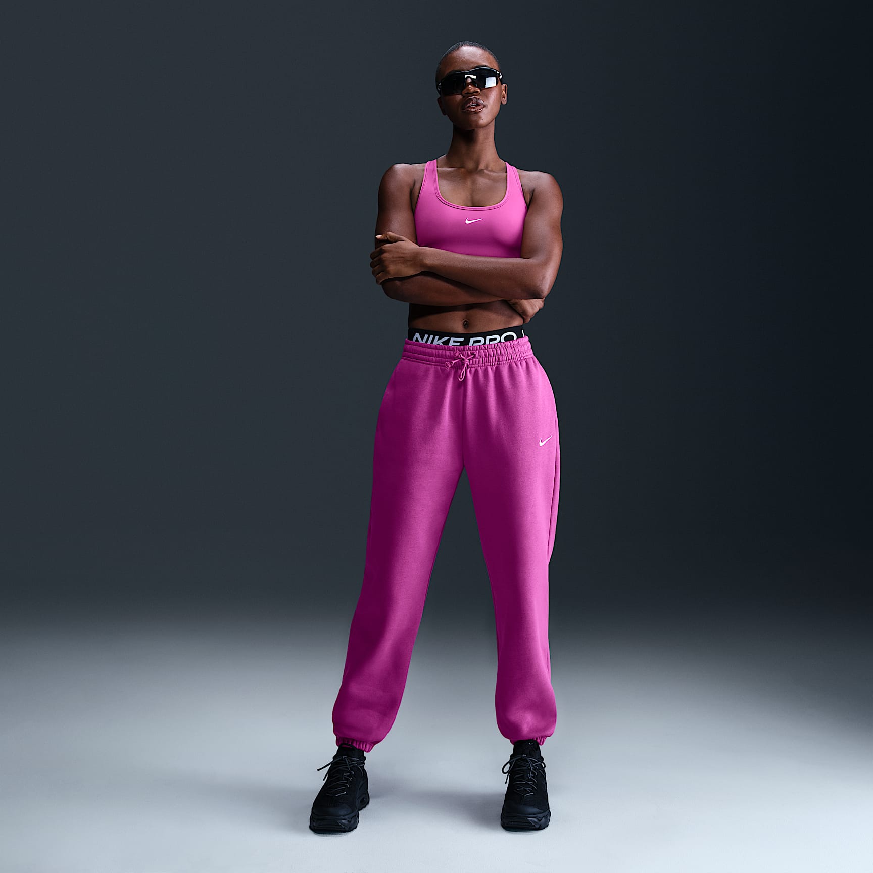 Pants de entrenamiento oversized de tiro alto para mujer Nike Sportswear Phoenix Fleece