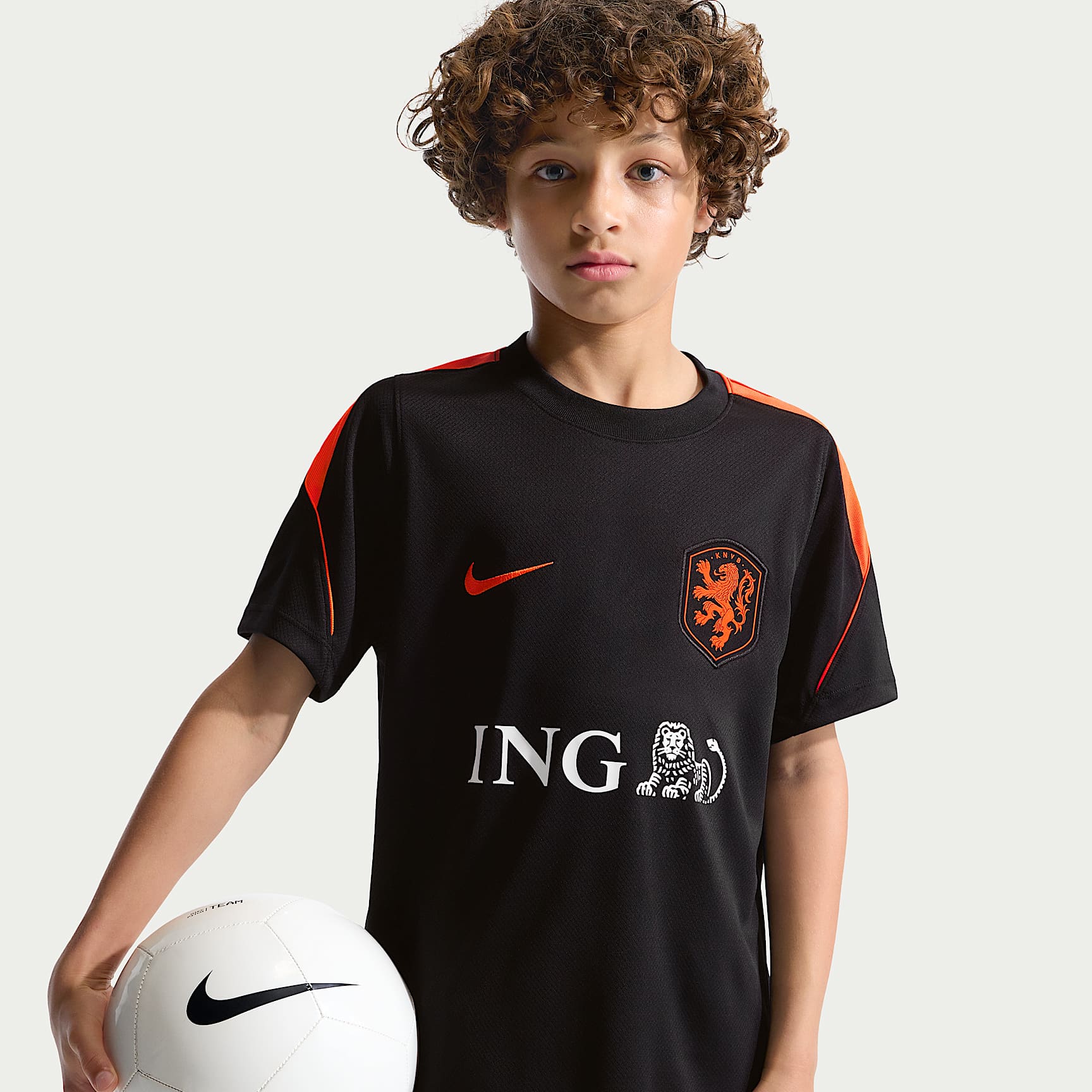 Netherlands Strike Older Kids' Nike Football Dri-FIT Short-Sleeve Top