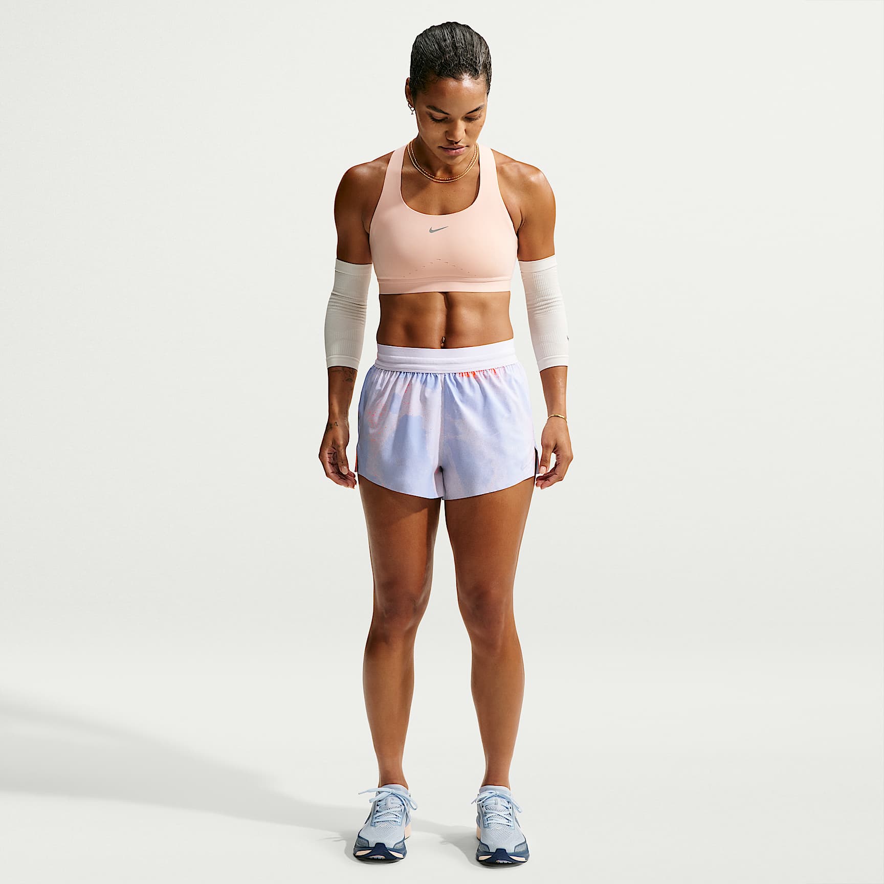 Shorts da running 6 cm Dri-FIT a vita media con slip Nike Swift – Donna