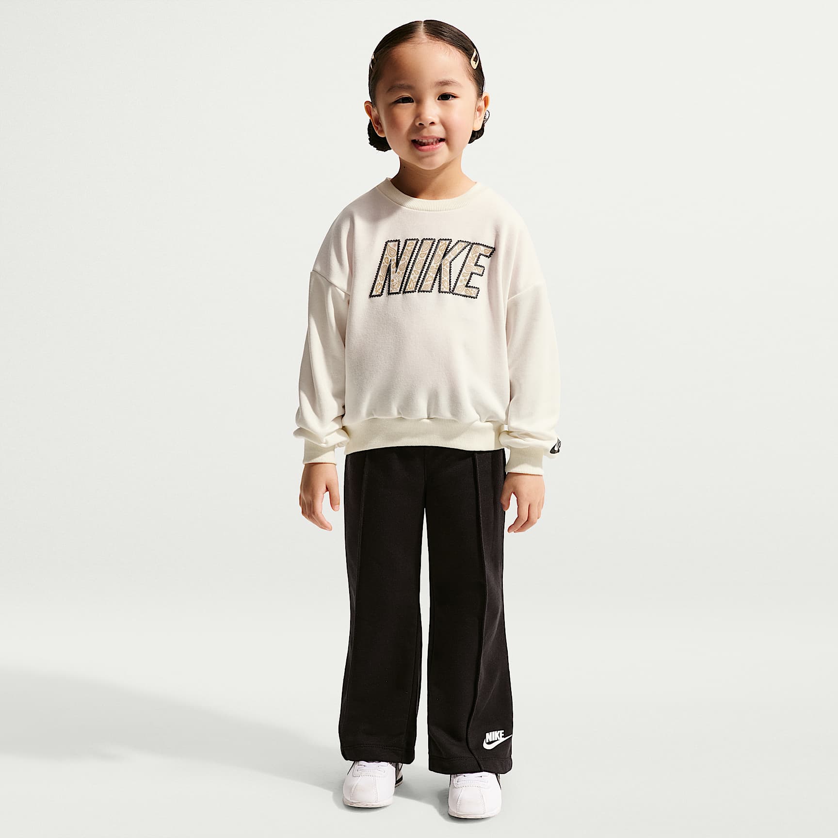 Conjunto de 2 piezas infantil Nike Retro Remix con pants de French Terry de pierna ancha