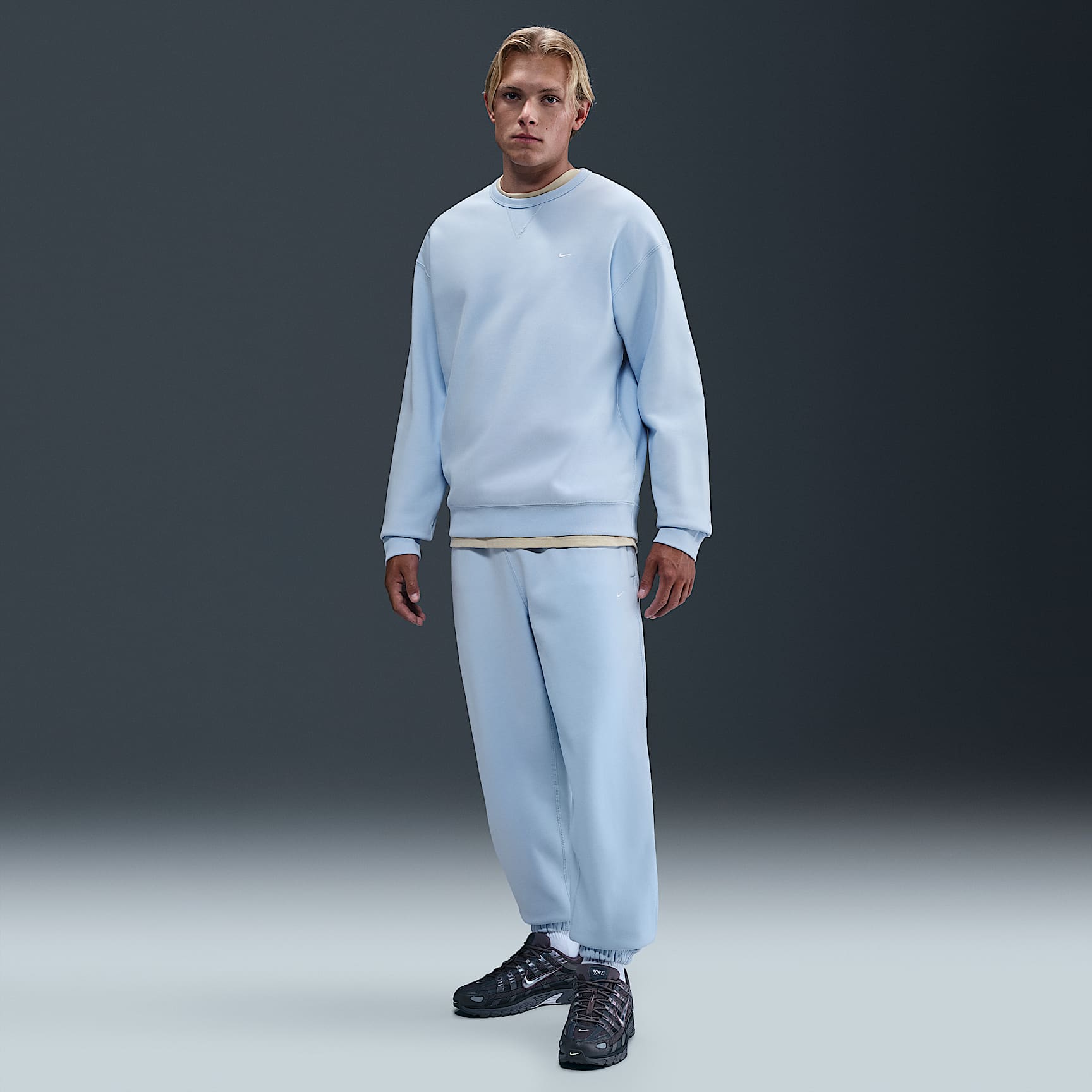 Pants de tejido Fleece con puños para hombre Nike Solo Swoosh