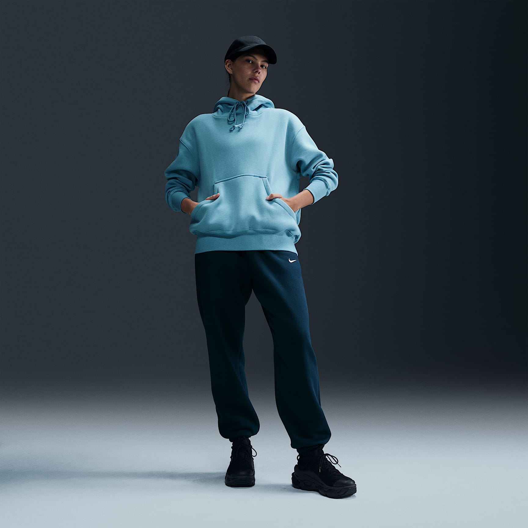 Pants de entrenamiento oversized de tiro alto para mujer Nike Sportswear Phoenix Fleece