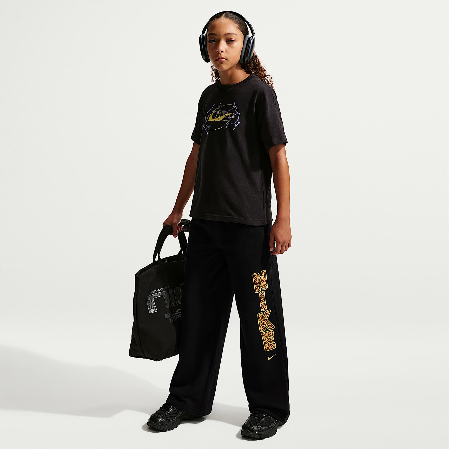 Pants de tejido Fleece con dobladillo abierto para niña talla grande Nike Sportswear Studio