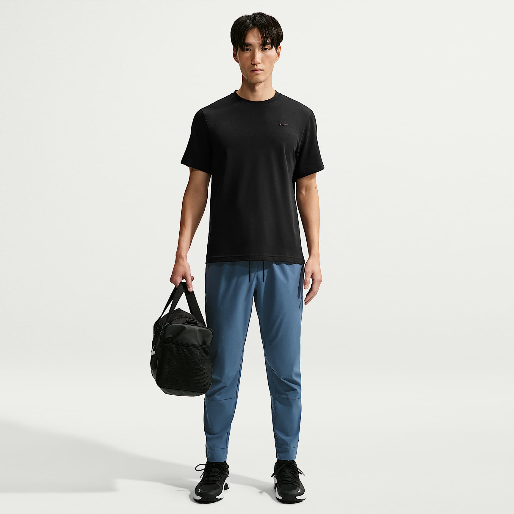 Pants versátiles Dri-FIT con puños con cierre para hombre Nike Unlimited