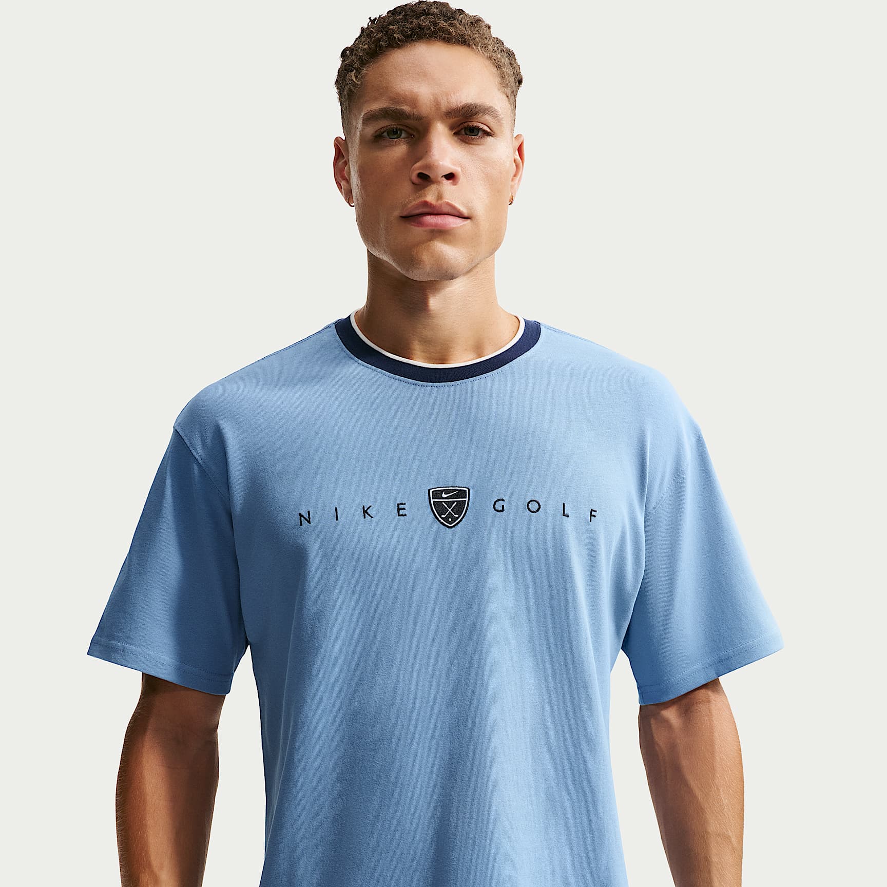 Playera de golf de corte holgado para hombre Nike