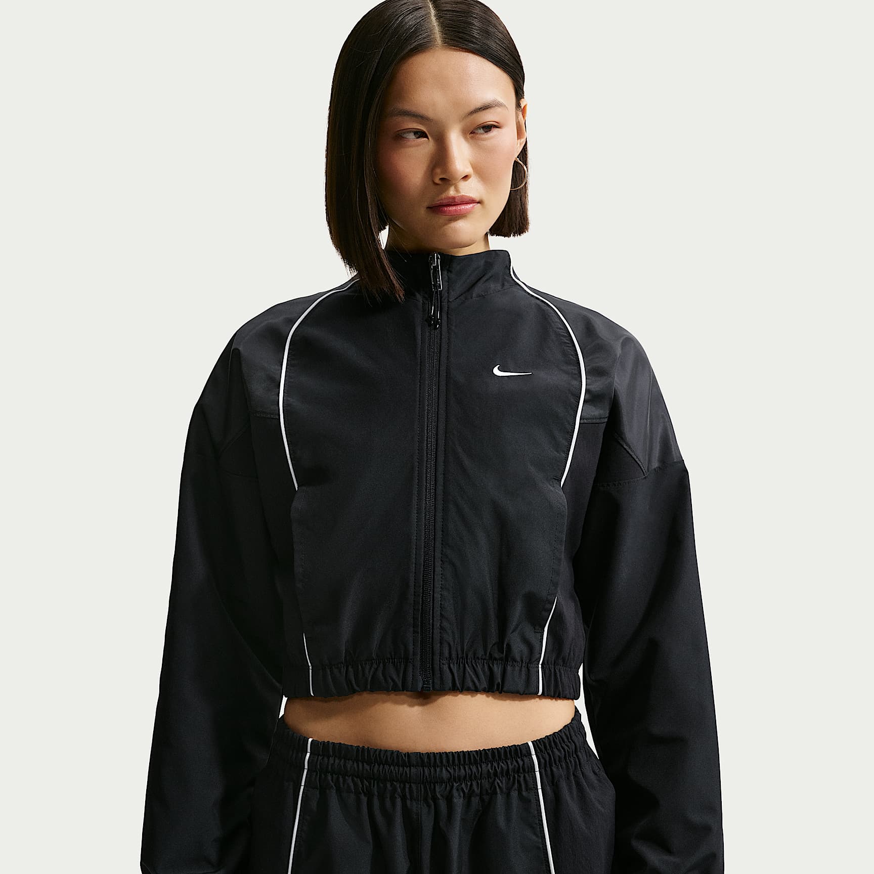 เสื้อแจ็คเก็ตวอร์มผู้หญิงรัดรูป Nike Sportswear