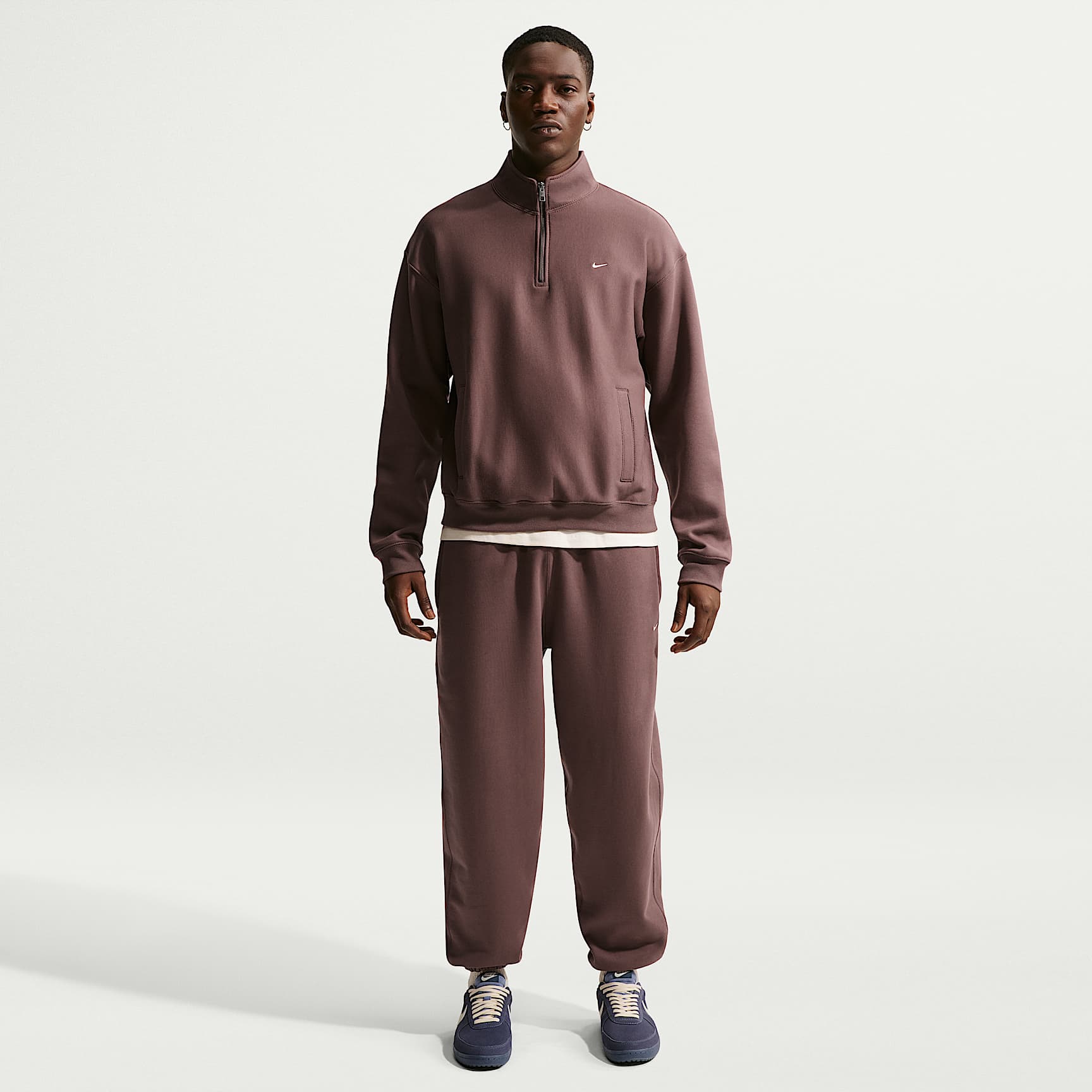 Pants de tejido Fleece con puños para hombre Nike Solo Swoosh