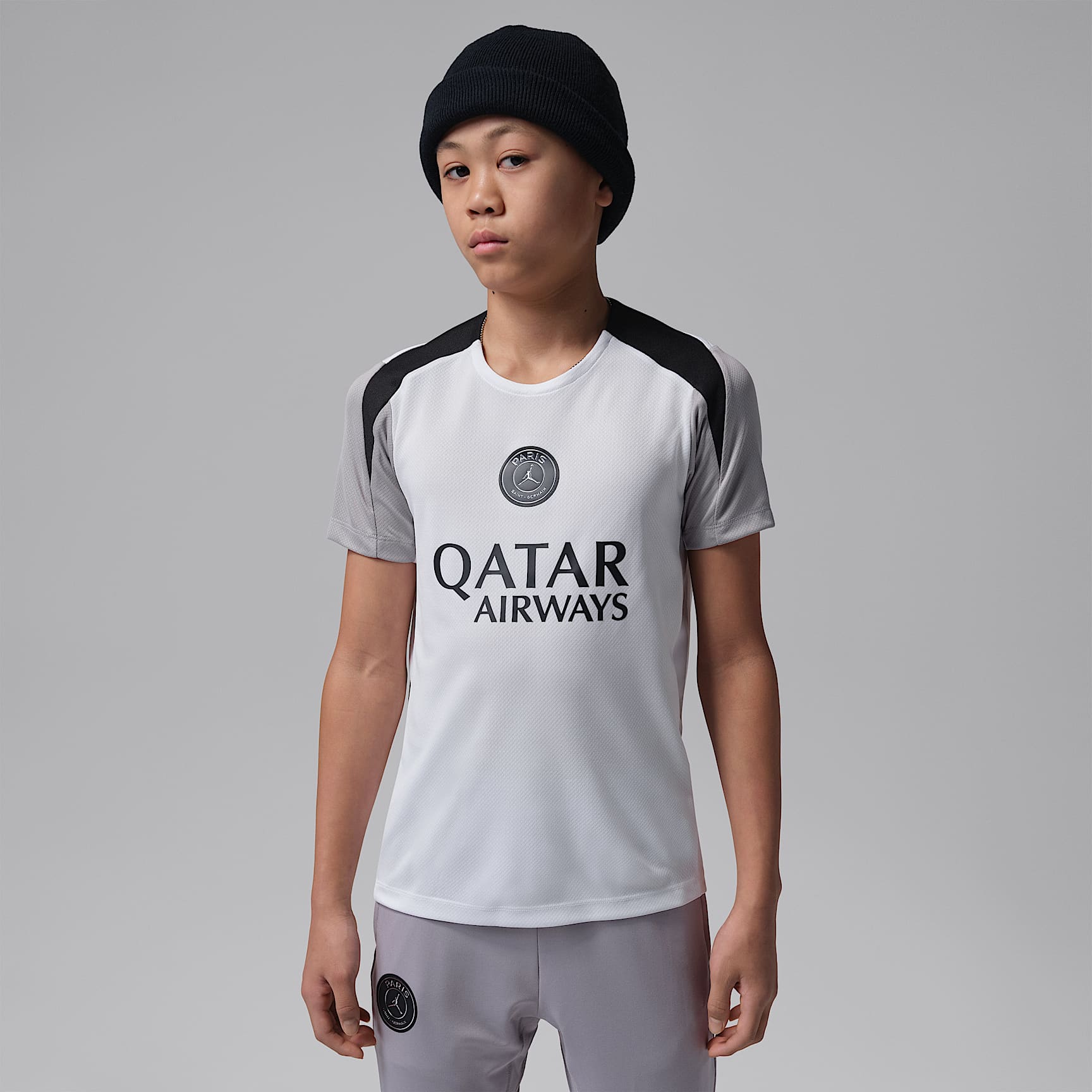 Paris Saint-Germain Strike Night Edition Older Kids' Jordan Dri-FIT Football Short-Sleeve Knit Top