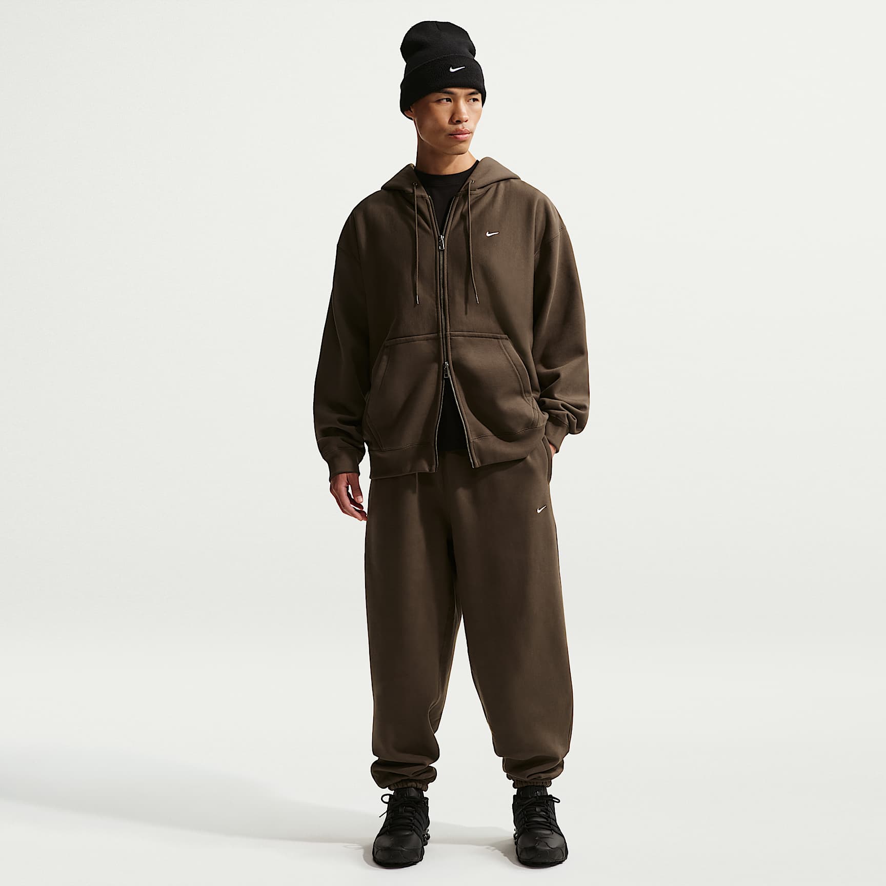 Pants de tejido Fleece con puños para hombre Nike Solo Swoosh