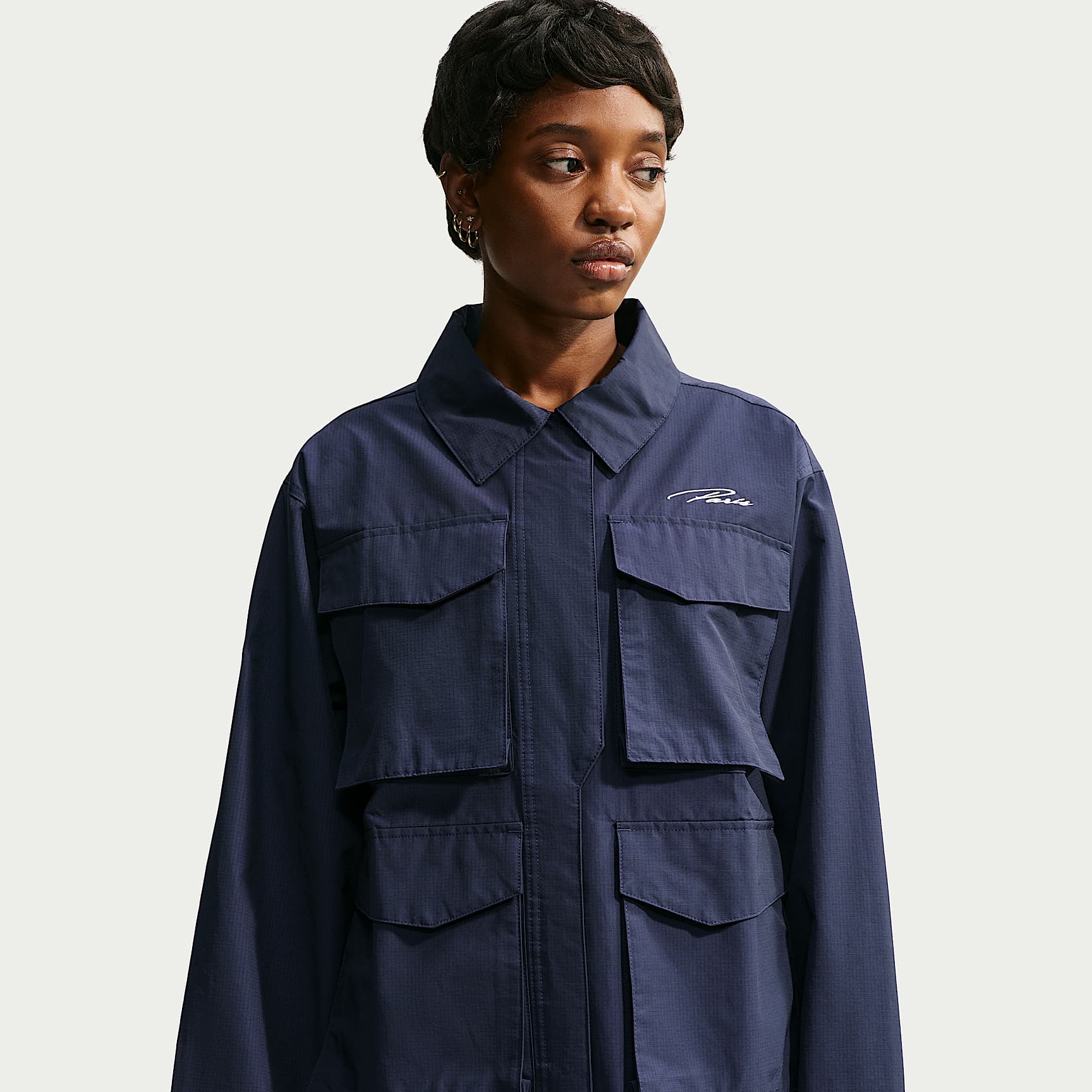 Paris Saint-Germain Everything Wovens (bortedrakt) Nike Sportswear cargofotballjakke til dame