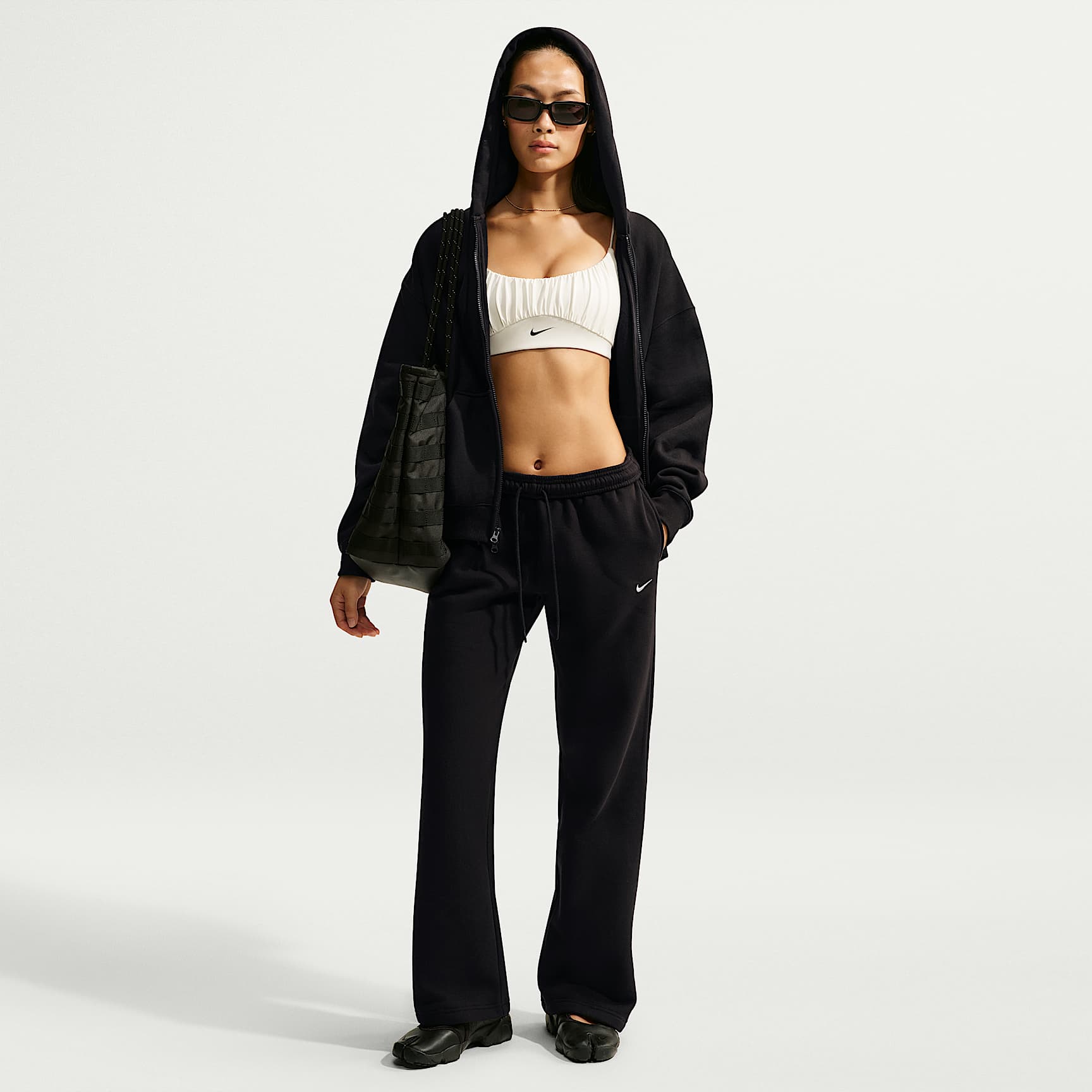 Nike Studio Fleece Medium Weight Pantalones de tiro medio con dobladillo abierto - Mujer