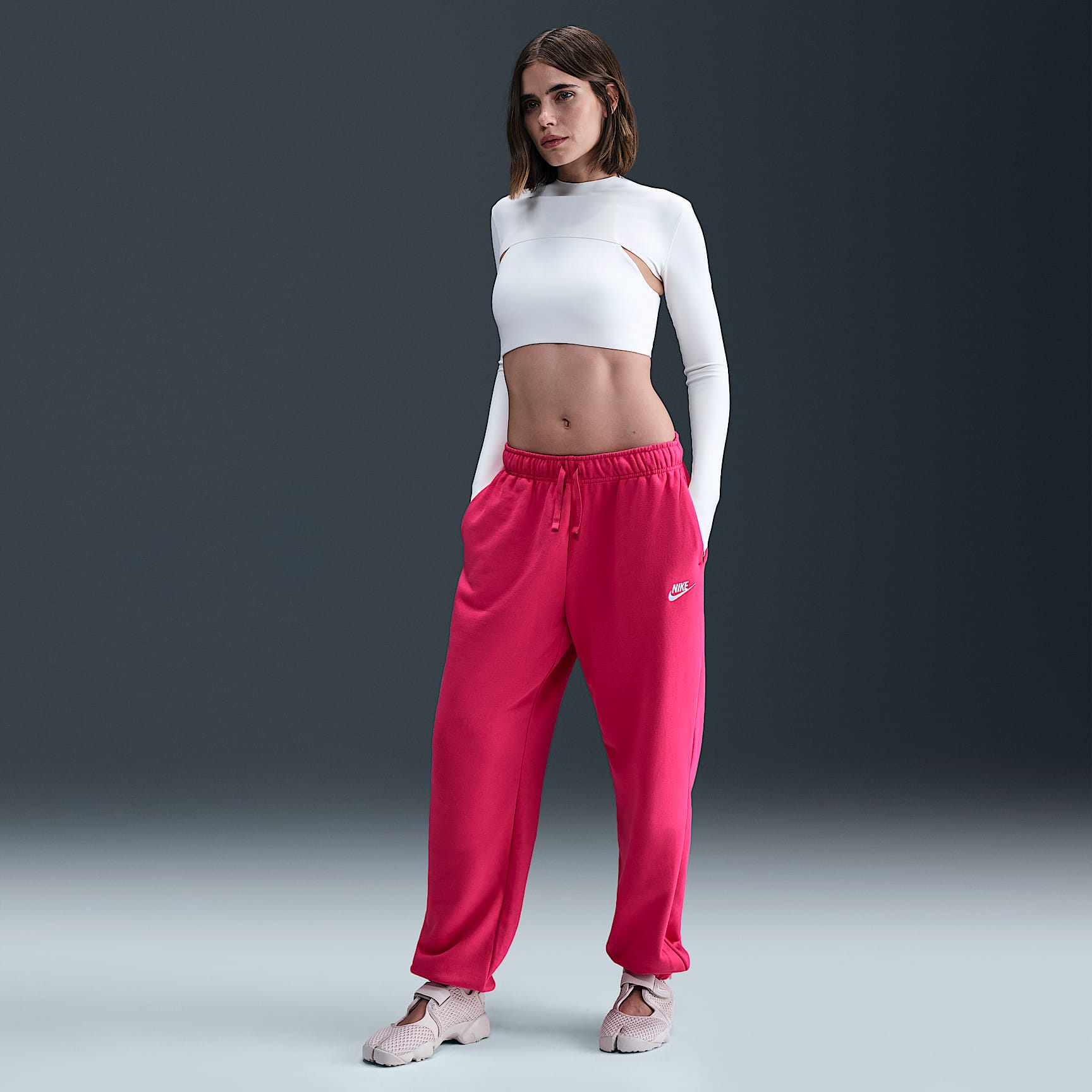 Pants de entrenamiento oversized de tiro medio para mujer Nike Sportswear Club Fleece