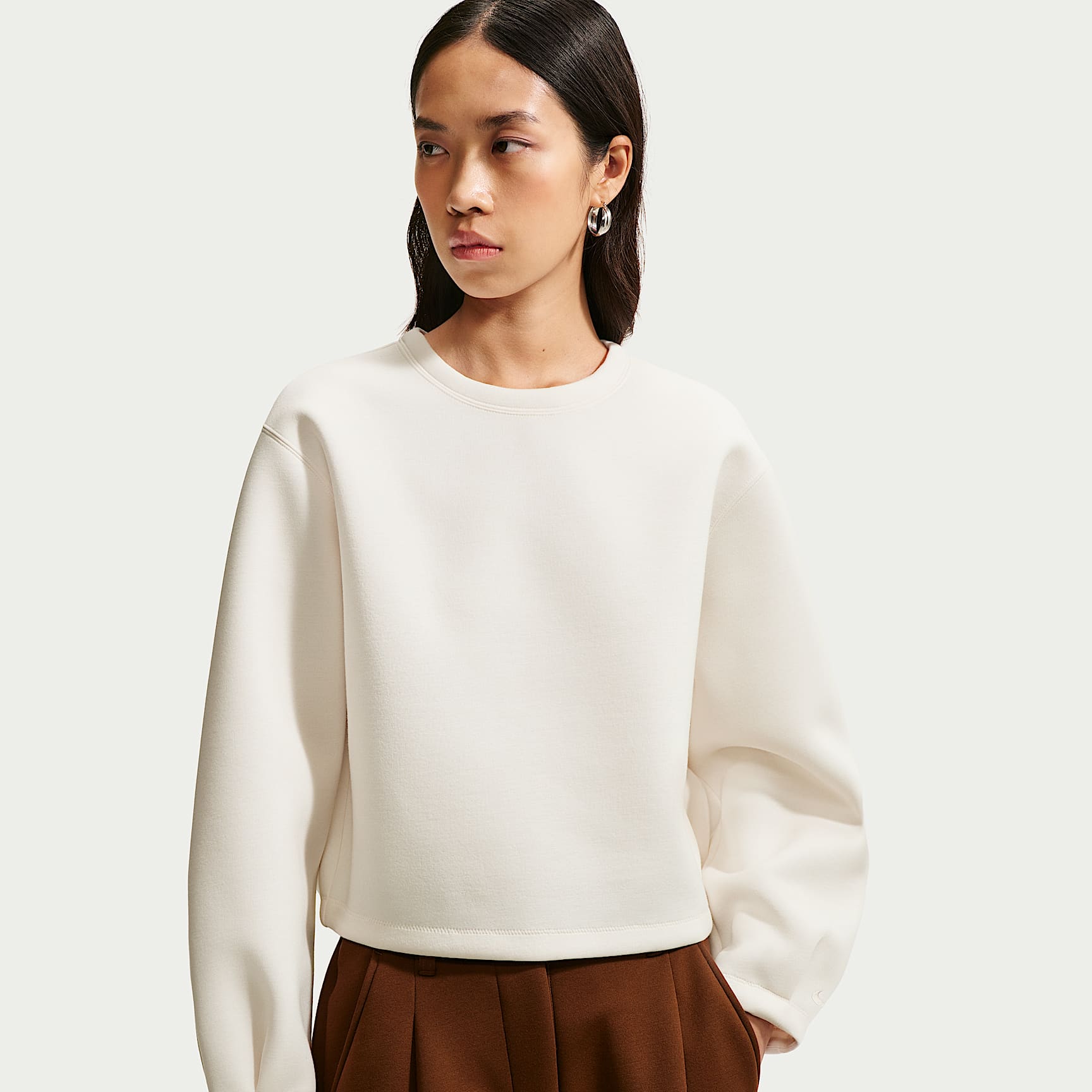 เสื้อแขนยาวทรงโอเวอร์ไซส์ผู้หญิง Nike Article Fleece