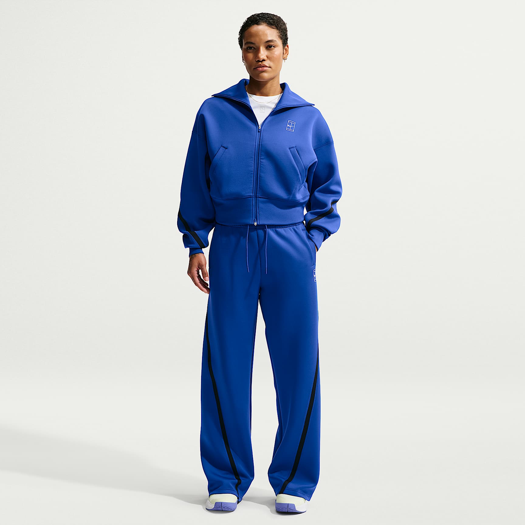 Nike Advantage Pantalons de tennis de cintura mitjana Dri-FIT - Dona