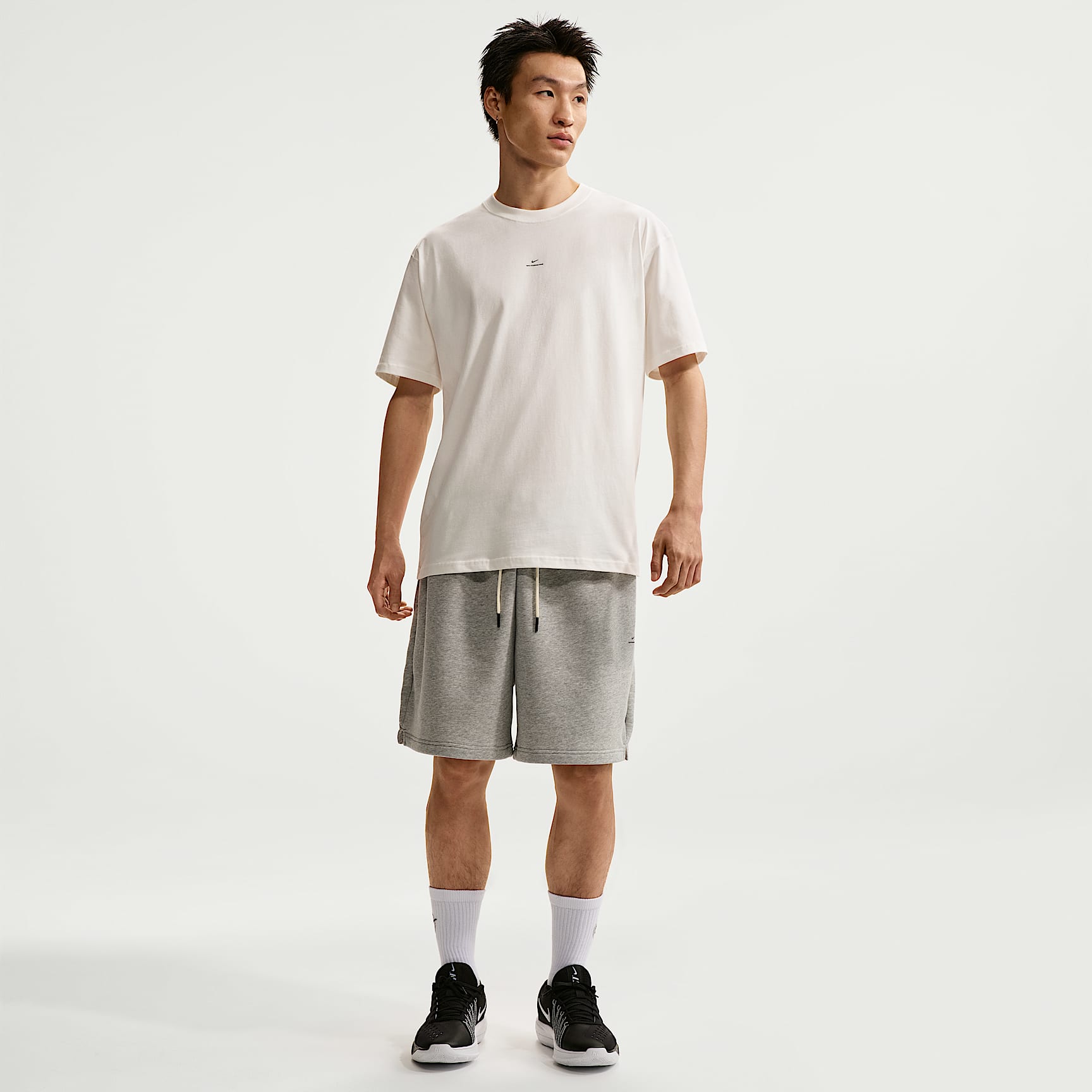 Nike Standard Issue Dri-FIT basketshorts i frottéfleece til herre (20 cm)